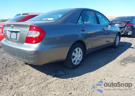 2004 Toyota Camry Le z USA, uszkodzony, nr VIN 4T1BE32K64U903368